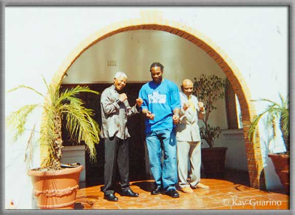 South African President Nelson Mandela, WBC Heavyweight Champion of the World
 Lennox Lewis