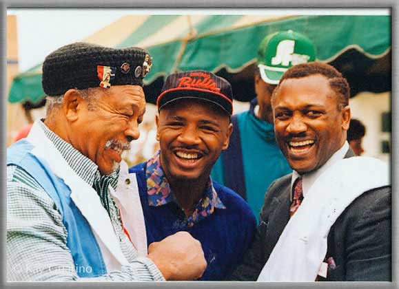 Light-heavyweight champion Archie Moore, The Marvelous One and heavyweight champion Smokin Joe Frazier.