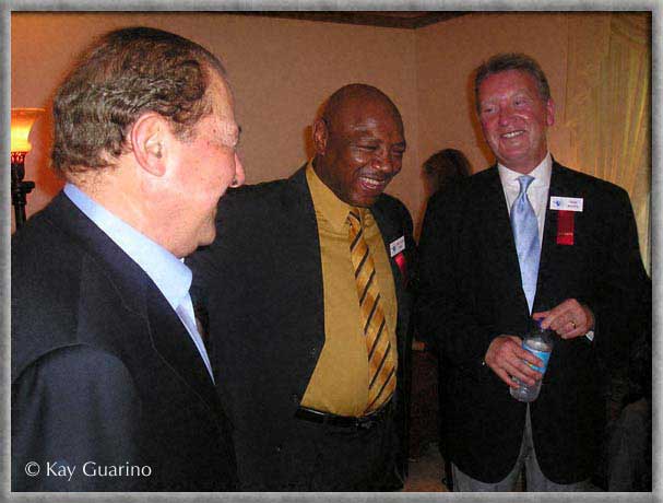 Marvelous Marvin Hagler with boxing promoter
Bob Arum from USA on left, and Frank Warren boxing promoter from UK on right. 